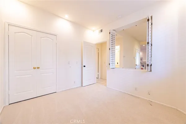 view of an empty room with a window