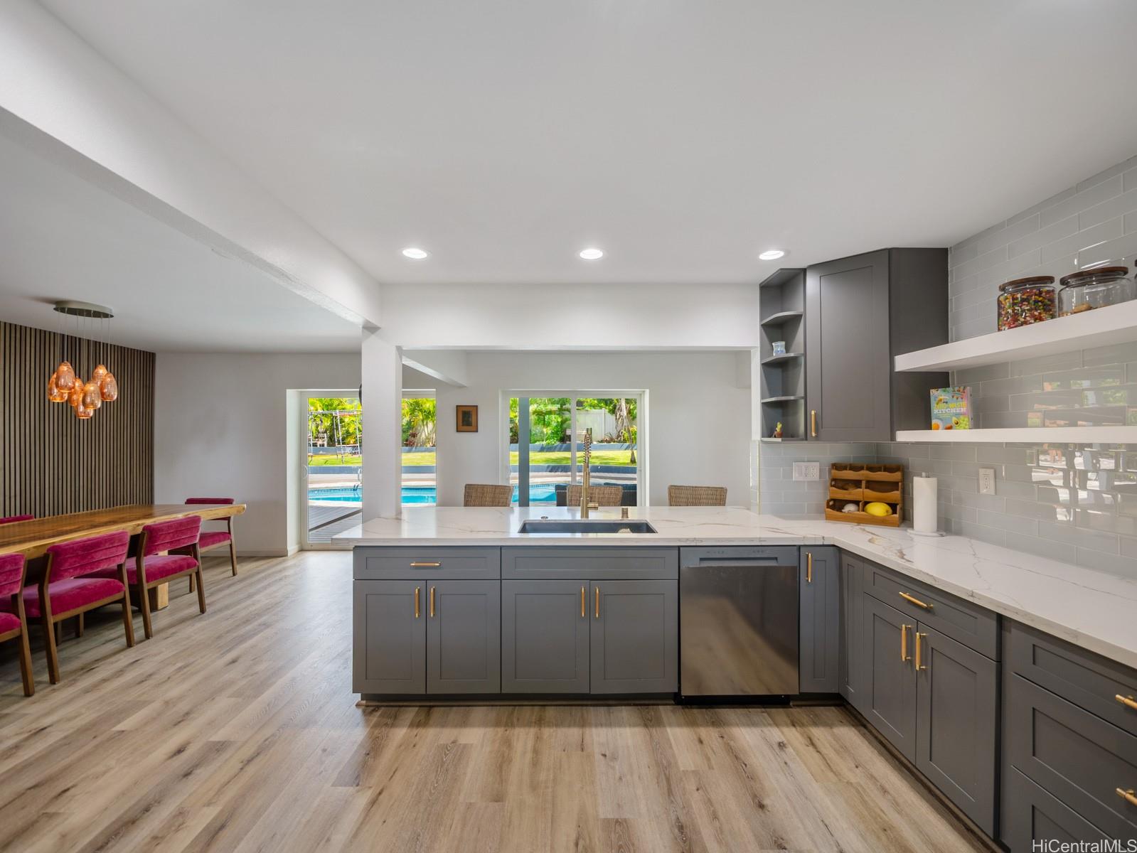 6815 Niumalu Loop Honolulu, HI 96825 - Photo 9 of 25 Open Kitchen with access to Living Room and Dining Area
