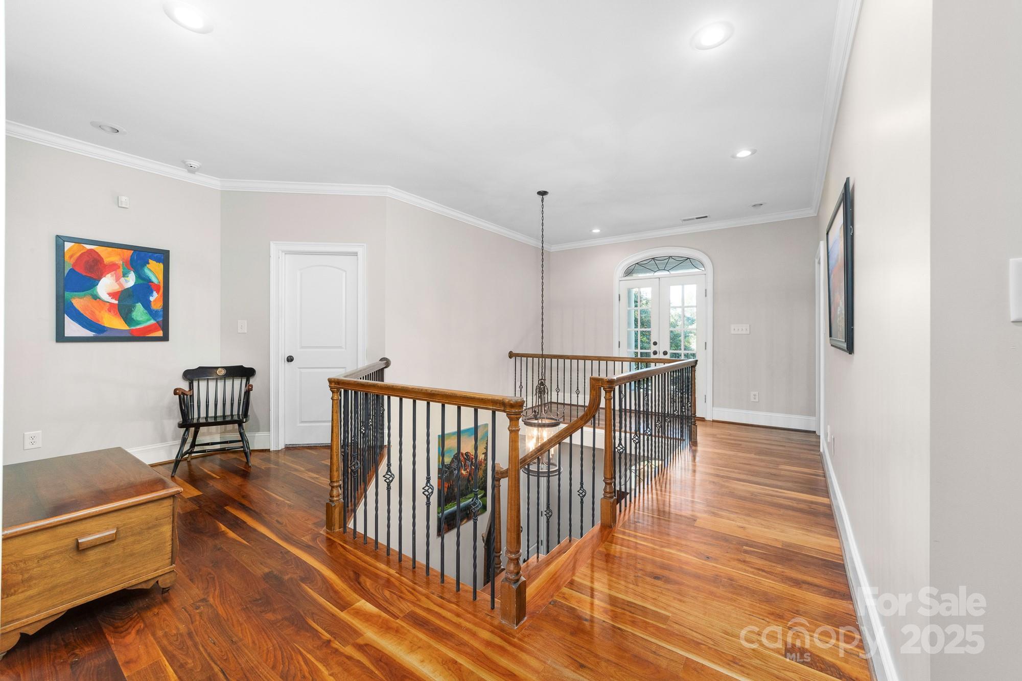 200 Galey Ridge Cramerton, NC 28032 - Photo 21 of 48 a view of a hallway with wooden floor and stairs