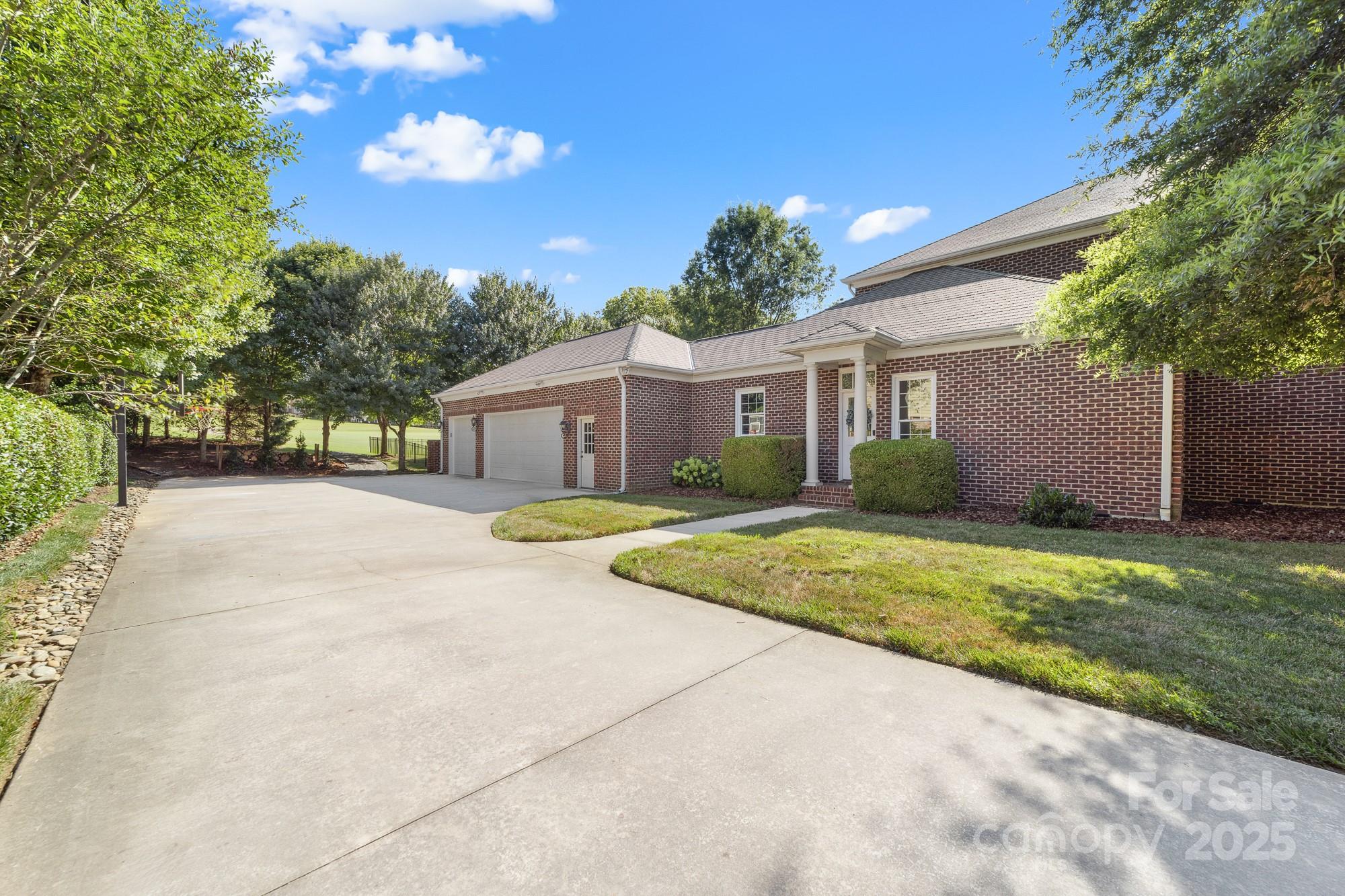 200 Galey Ridge Cramerton, NC 28032 - Photo 35 of 48 a front view of a house with garden