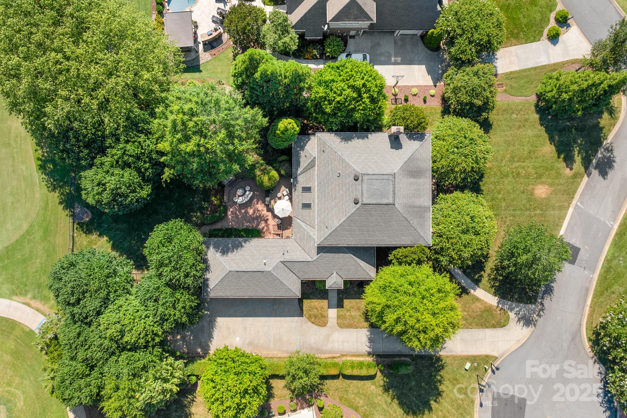 200 Galey Ridge Cramerton, NC 28032 - Photo 43 of 48 an aerial view of a house with large trees