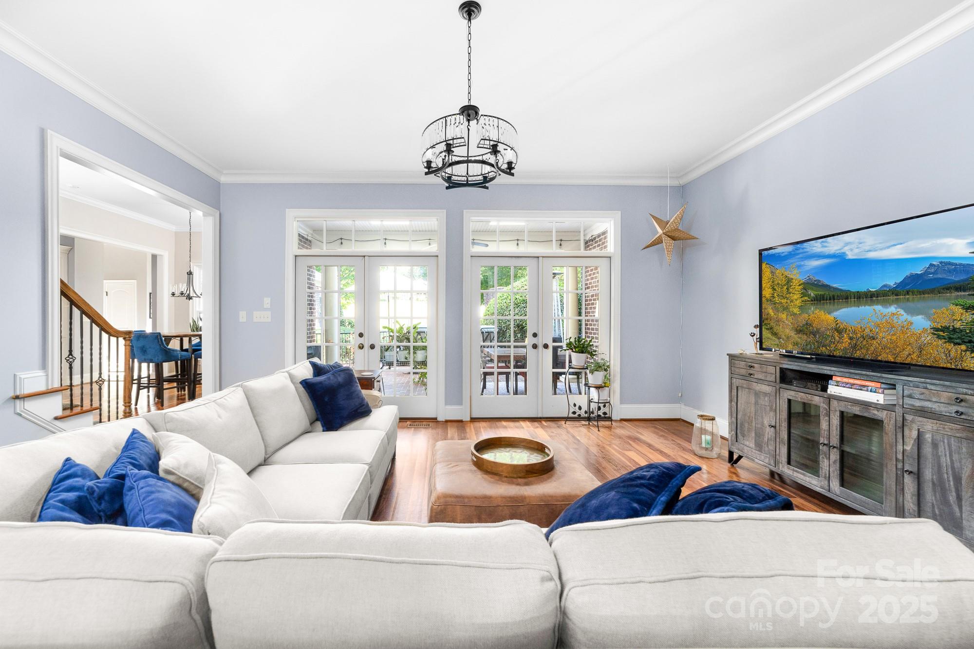 200 Galey Ridge Cramerton, NC 28032 - Photo 8 of 48 a living room with furniture chandelier and a flat screen tv