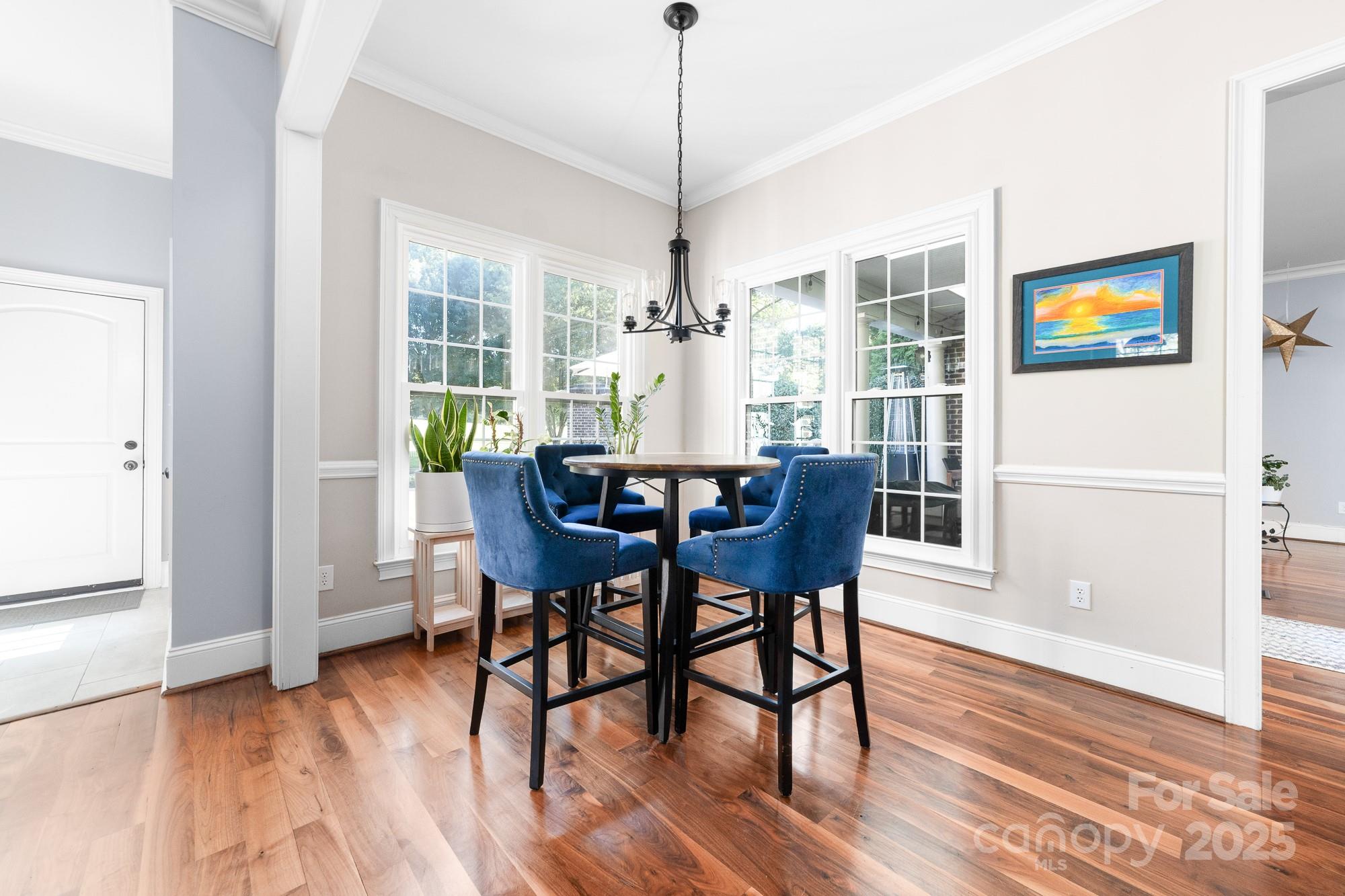 200 Galey Ridge Cramerton, NC 28032 - Photo 10 of 48 a view of a dining room with furniture window and wooden floor