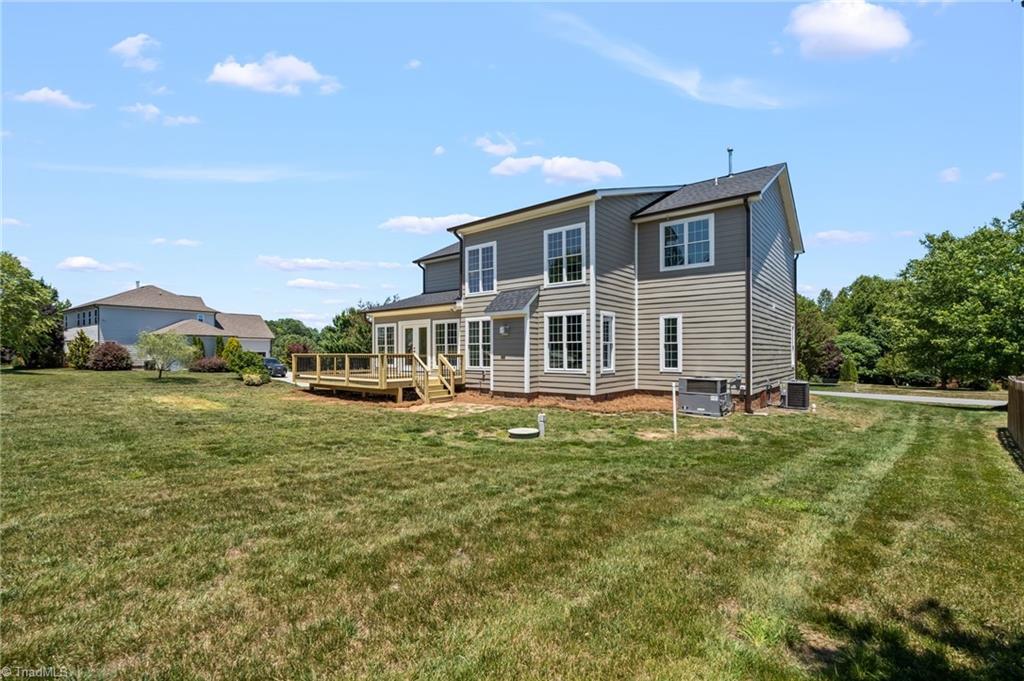 8419 Pheasant Ridge Drive Colfax, NC 27235 - Photo 44 of 49 Step right out the kitchen space to entertain family and friends!