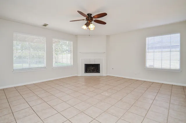a kitchen with cabinets stainless steel appliances and a counter space
