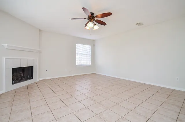 a kitchen with a stove top oven sink and cabinets