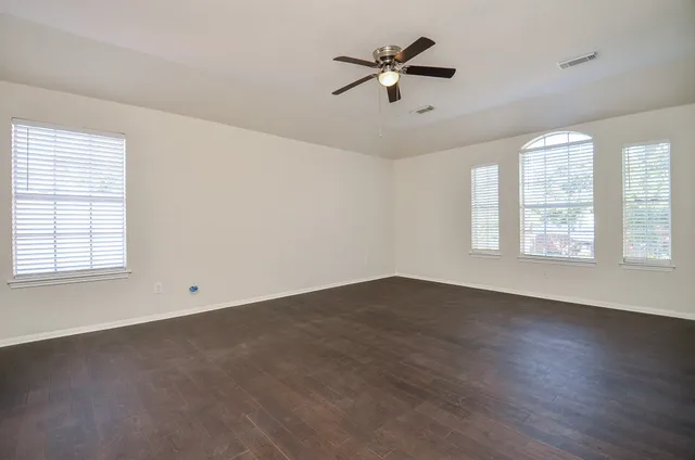 a bathroom with a double vanity sink and mirror
