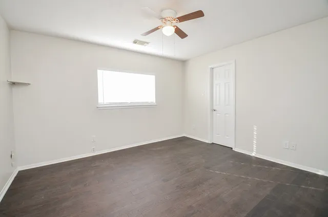 a view of backyard with large window