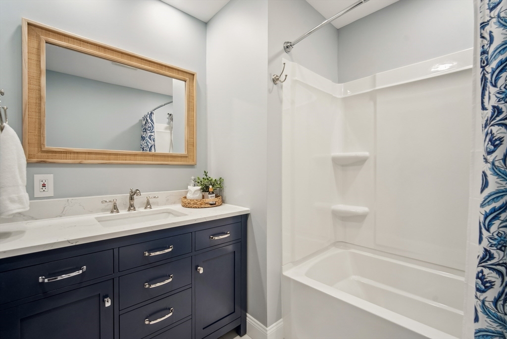 108 Berwick Road Longmeadow, MA 01106 - Photo 31 of 42 a bathroom with a tub sink and mirror
