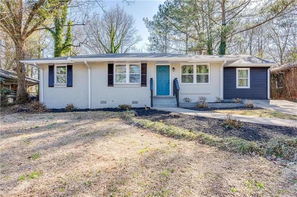 2815 Mitchell Drive Decatur, GA 30032 - Photo 1 of 1 a view of a house with a yard