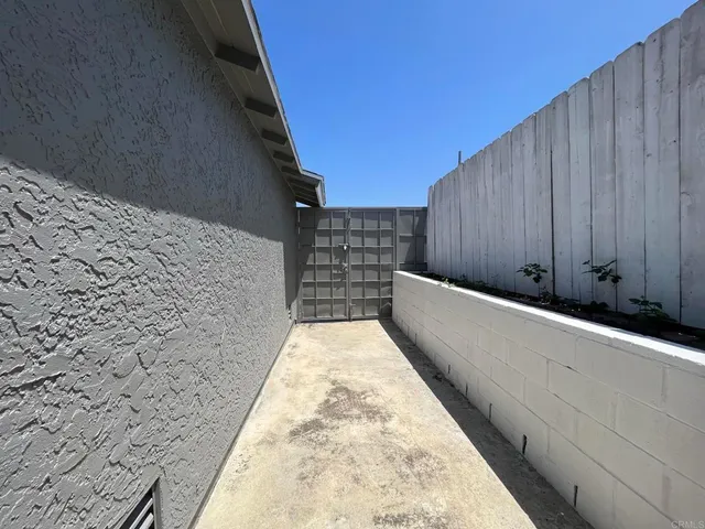 a view of hallway with windows