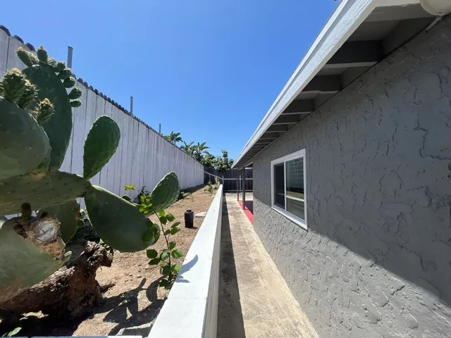 a house view with a outdoor space