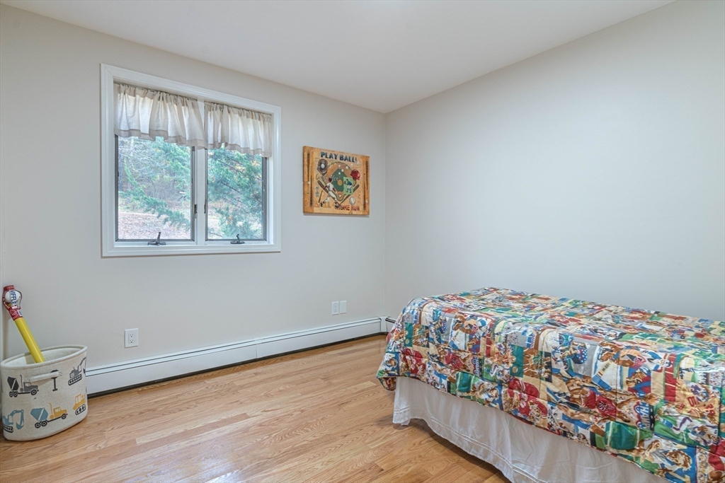 57 Town Farm Road Brookfield, MA 01506 - Photo 27 of 38 a bedroom with a bed and a window