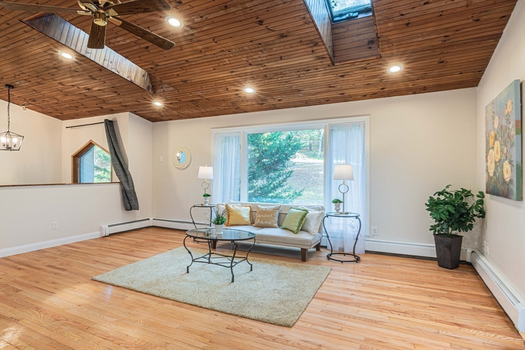 57 Town Farm Road Brookfield, MA 01506 - Photo 7 of 38 a living room with furniture and a wooden floor