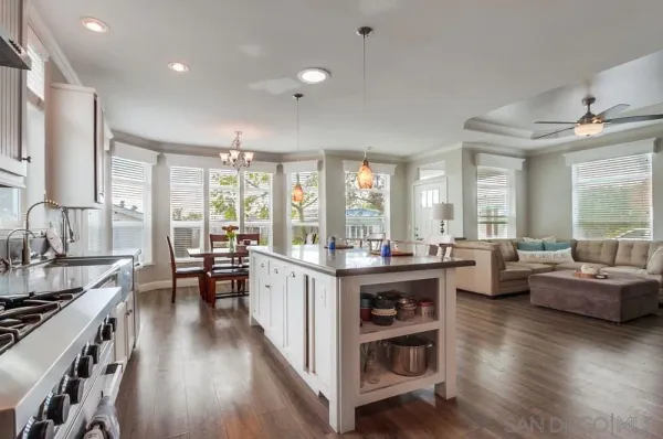 a spacious bathroom with double sink and a mirror