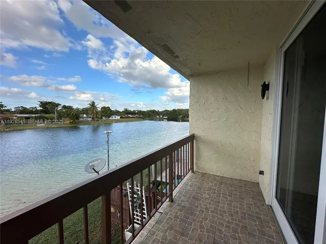 a view of a balcony with city view
