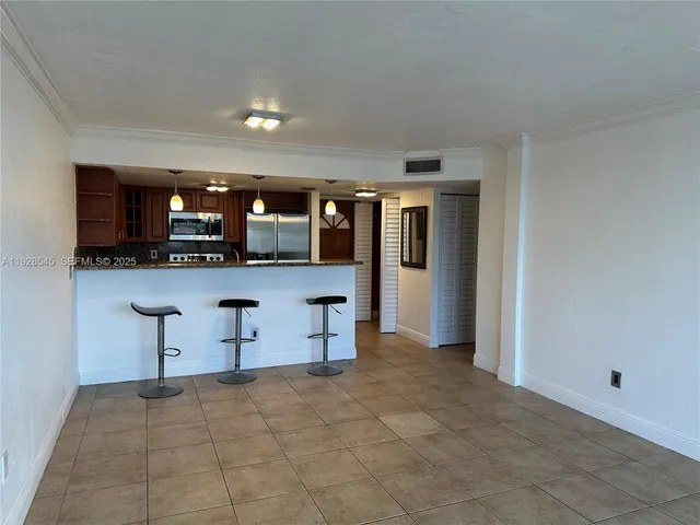 a view of a kitchen and a sink