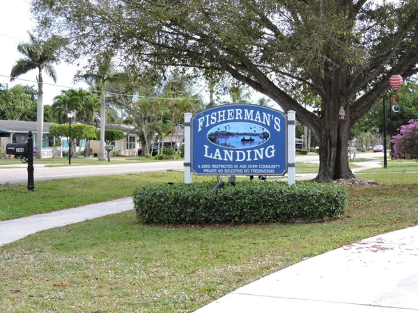 a sign on the side of a road