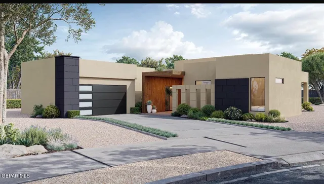 a front view of a house with yard and parking