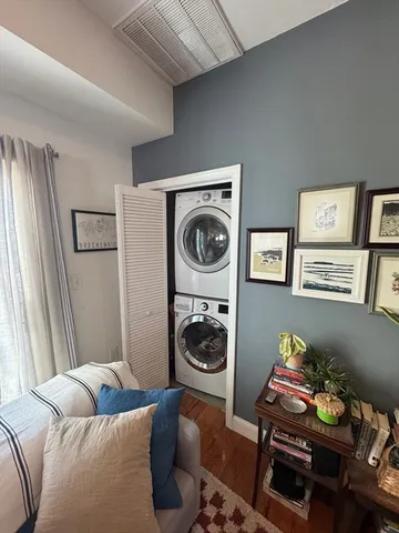 a bedroom with bed and a couch