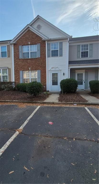 5764 Reps Trace Norcross, GA 30071 - Photo 1 of 25 a front view of a house with a yard