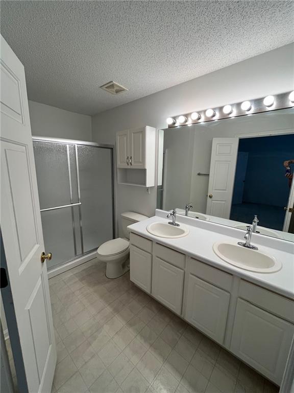 5764 Reps Trace Norcross, GA 30071 - Photo 21 of 25 a bathroom with a double vanity sink mirror and toilet