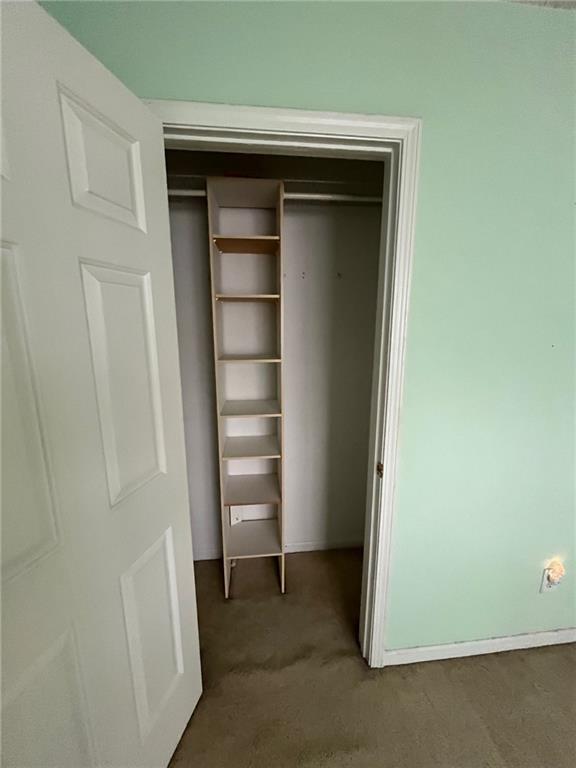 5764 Reps Trace Norcross, GA 30071 - Photo 3 of 25 a view of walk in closet with empty racks