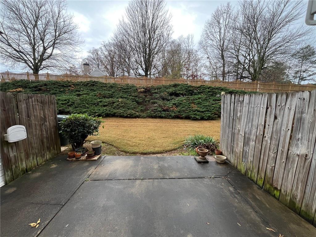 5764 Reps Trace Norcross, GA 30071 - Photo 6 of 25 a view of backyard with outdoor seating and green space