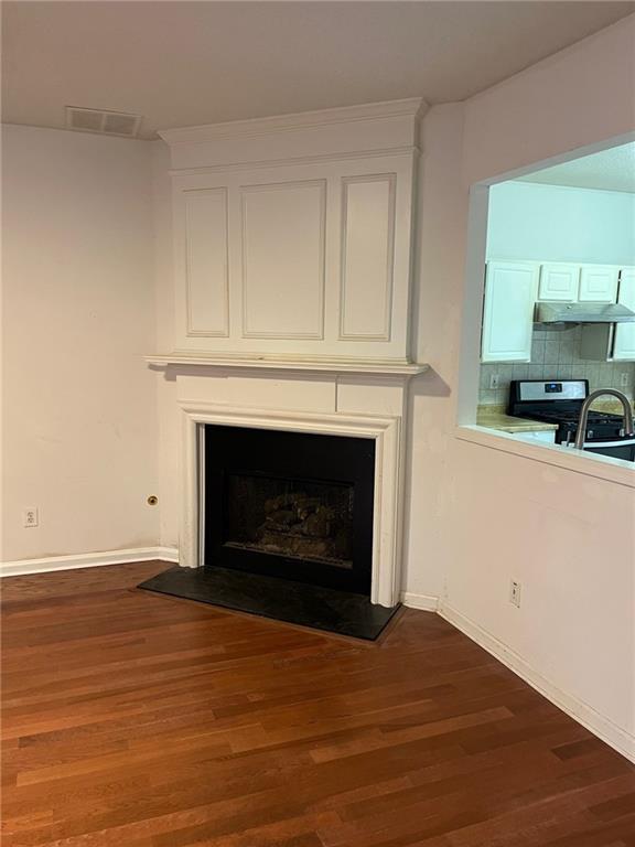 5764 Reps Trace Norcross, GA 30071 - Photo 8 of 25 a room with a fireplace and a fireplace