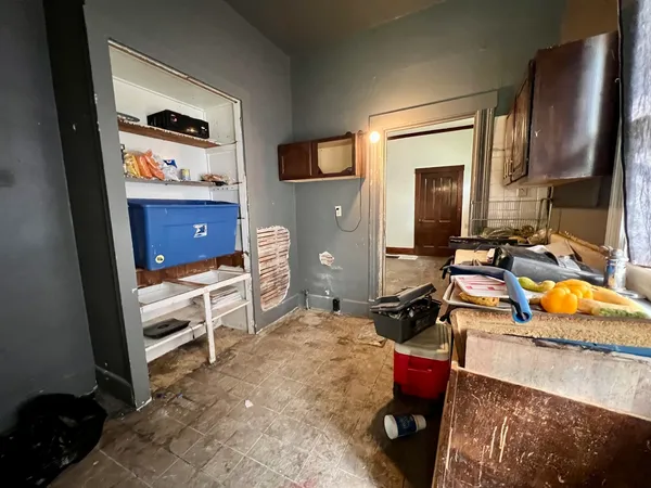 a bedroom with a bed and a flat tv screen