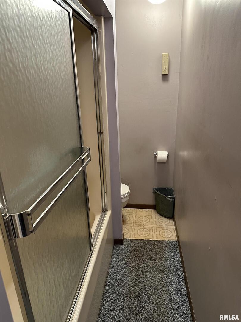 7863 Idyle Wild Road Du Quoin, IL 62832 - Photo 13 of 18 a view of a door and chair