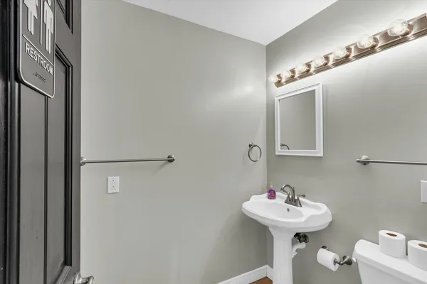 a view of room with window and a ceiling fan