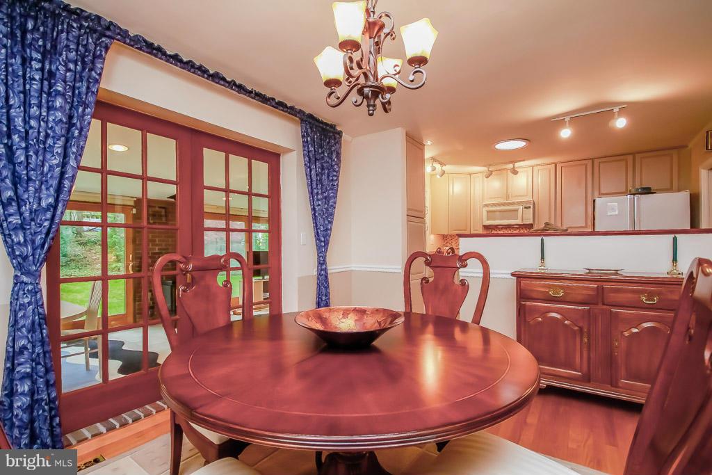 Dining Room with French Doors to Family Rm