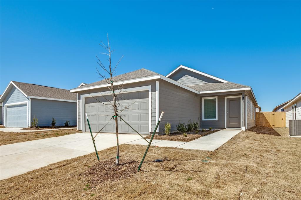 1243 Hackberry Trail Wilmer, TX 75172 - Photo 1 of 1 a view of a house with a yard
