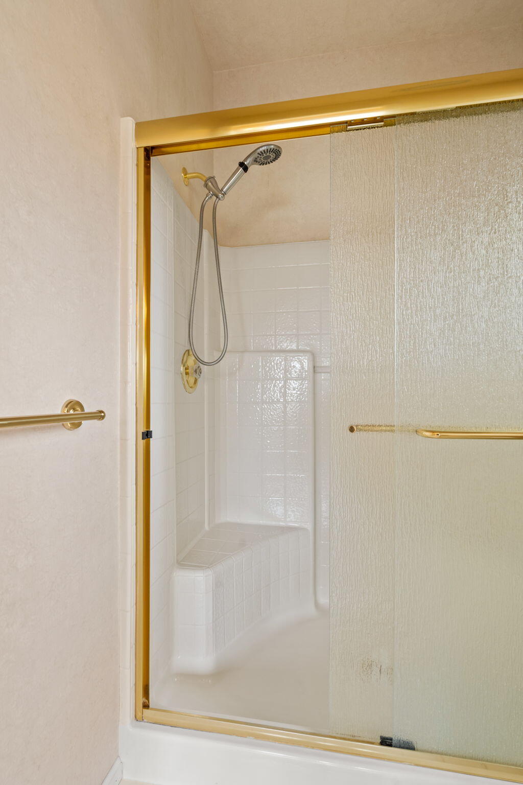 61504 Southeast Hill Ridge Road Bend, OR 97702 - Photo 36 of 70 a bathroom with a glass shower door