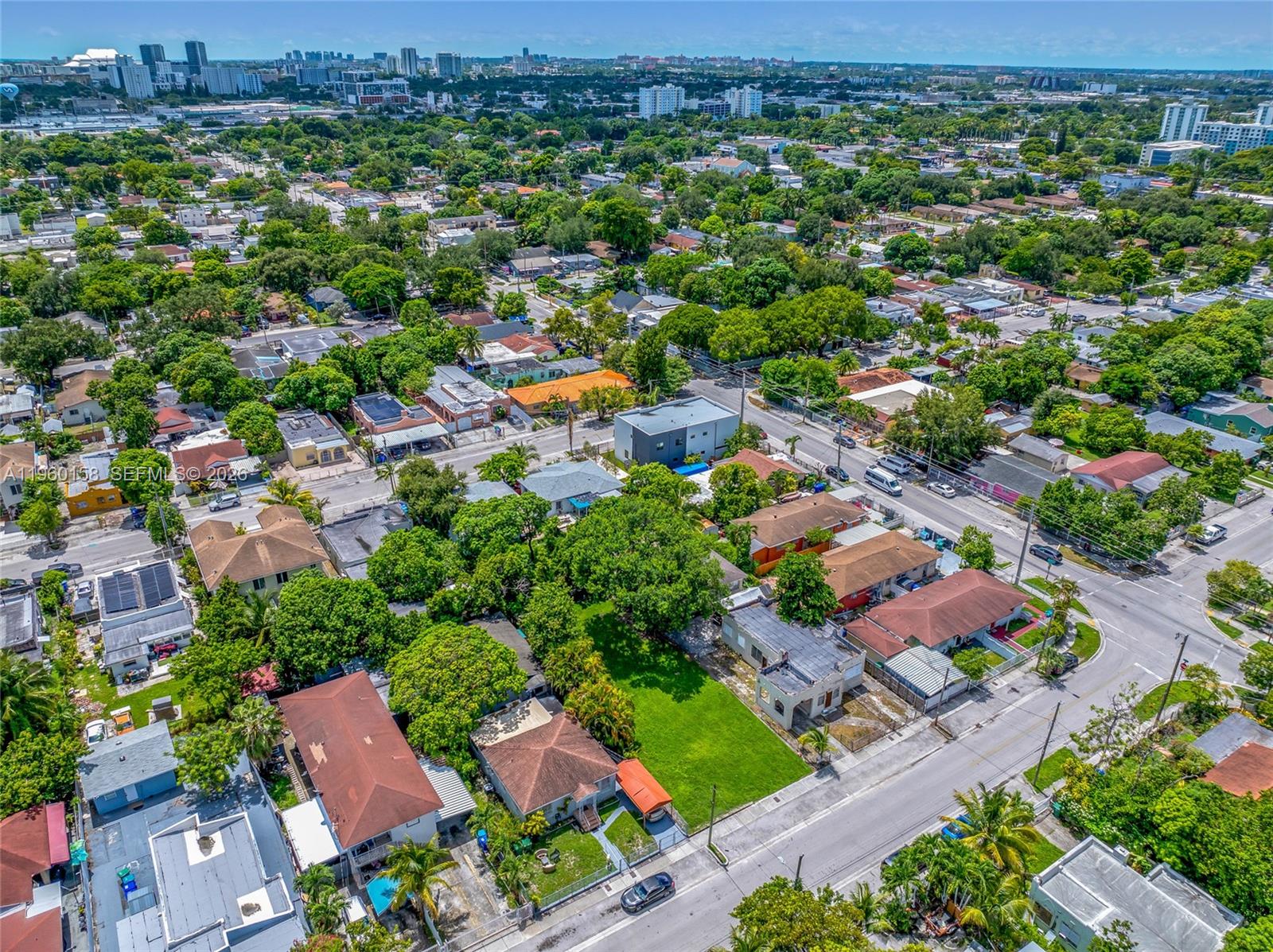 1376 Northwest 32nd Street Miami, FL 33142 - Photo 11 of 15 an aerial view of residential houses with outdoor space