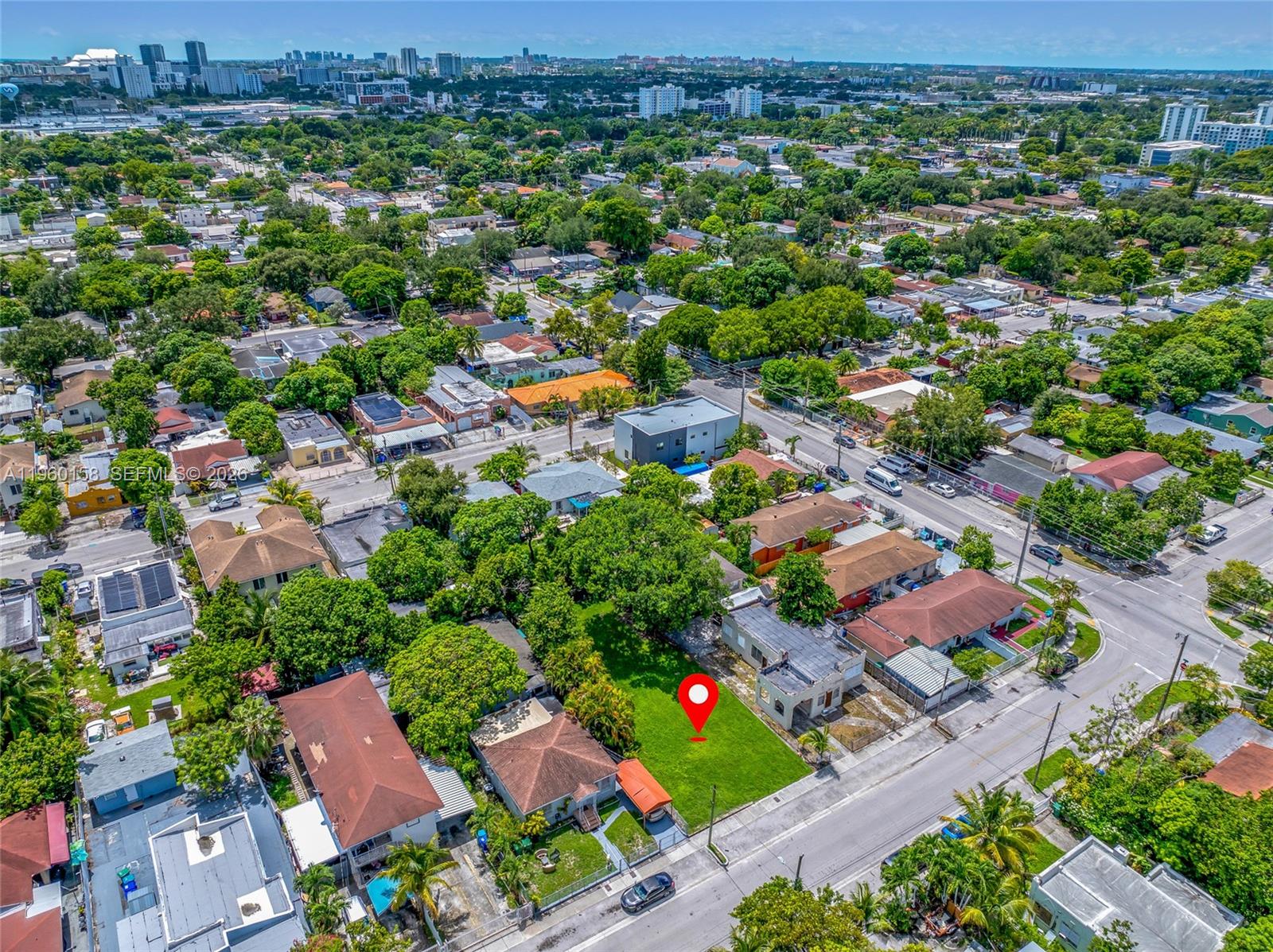 1376 Northwest 32nd Street Miami, FL 33142 - Photo 12 of 15 an aerial view of a houses and an outdoor space