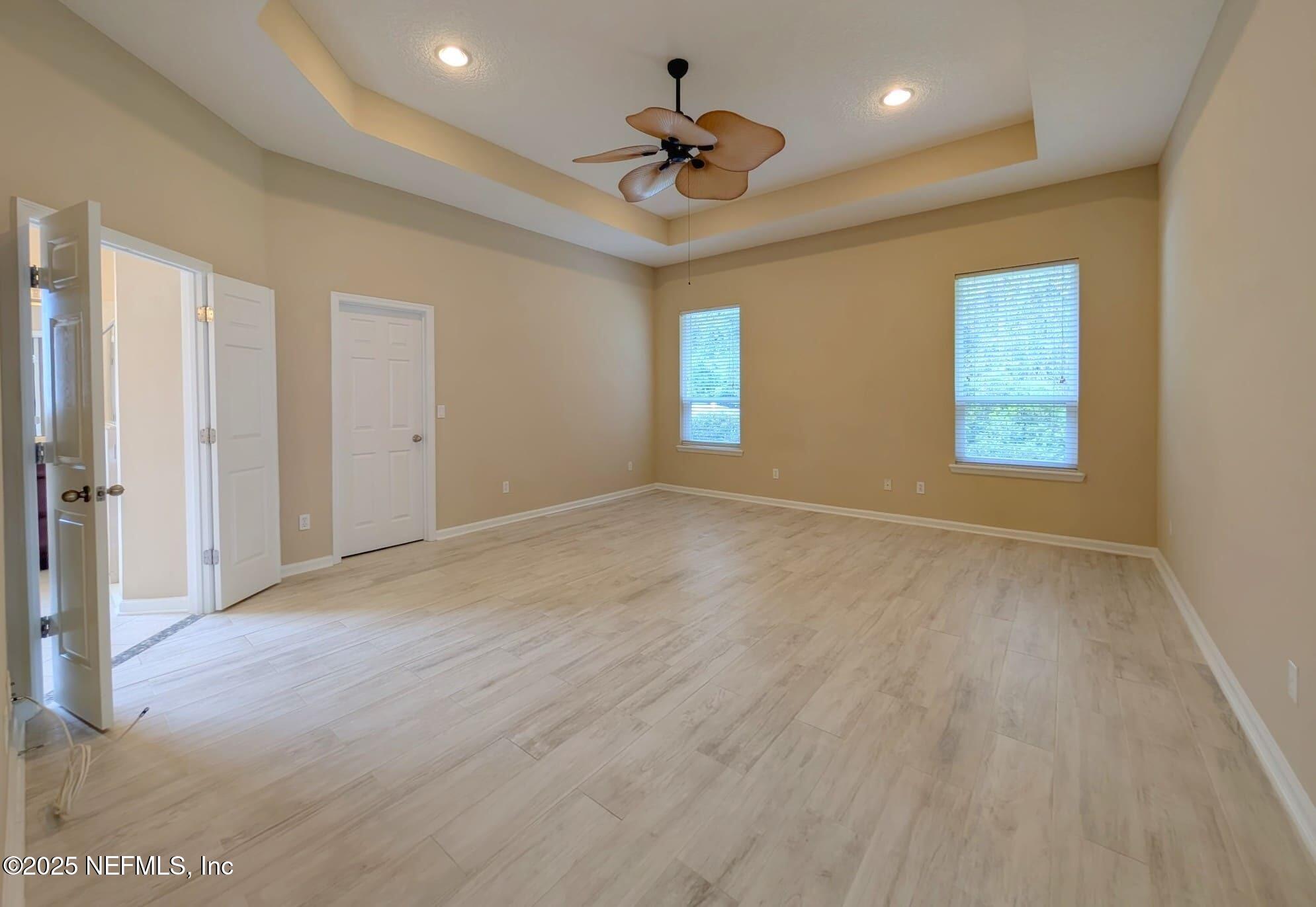 5871 Brush Hollow Road Jacksonville, FL 32258 - Photo 11 of 40 a view of an empty room with a window
