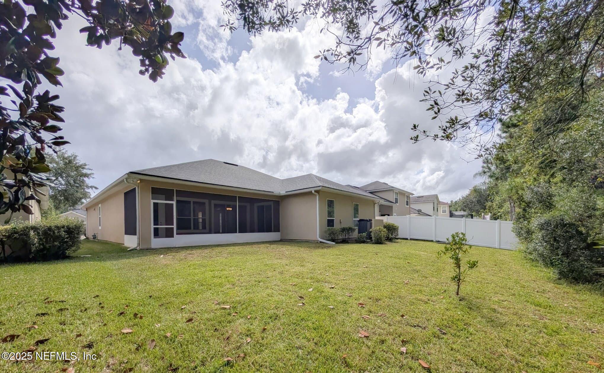 5871 Brush Hollow Road Jacksonville, FL 32258 - Photo 23 of 40 a view of a house with a yard