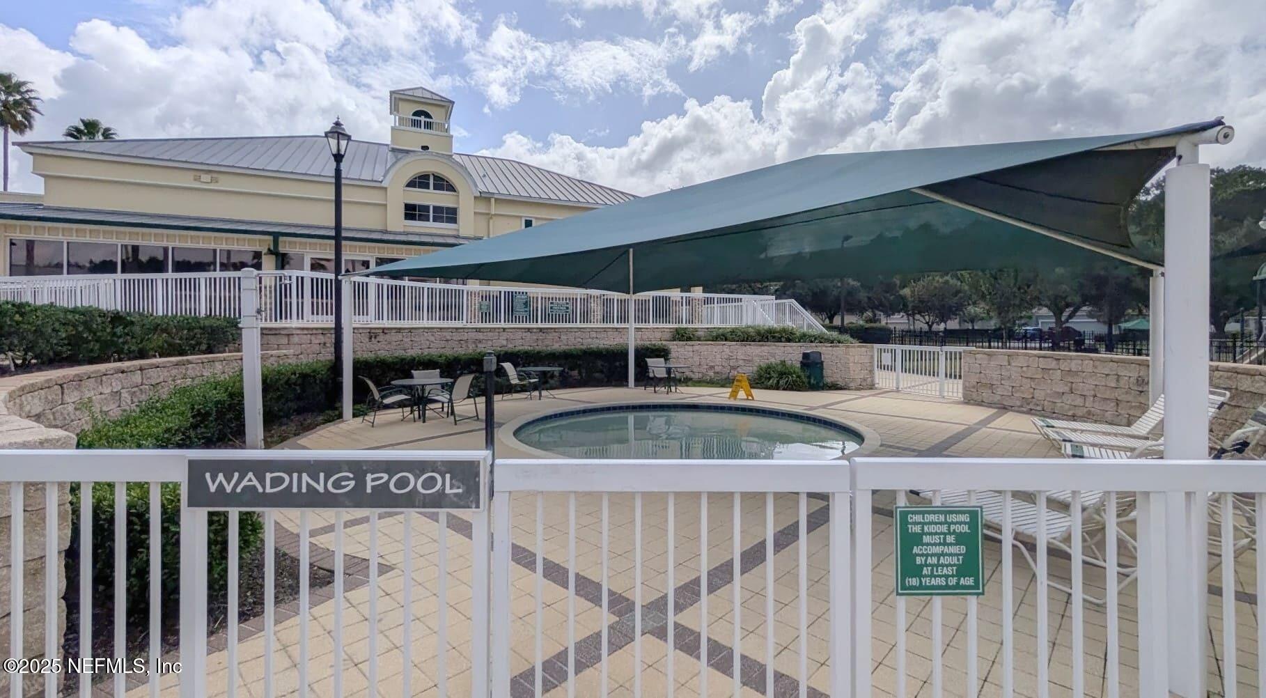 5871 Brush Hollow Road Jacksonville, FL 32258 - Photo 38 of 40 a dinning table and chairs in porch of a house