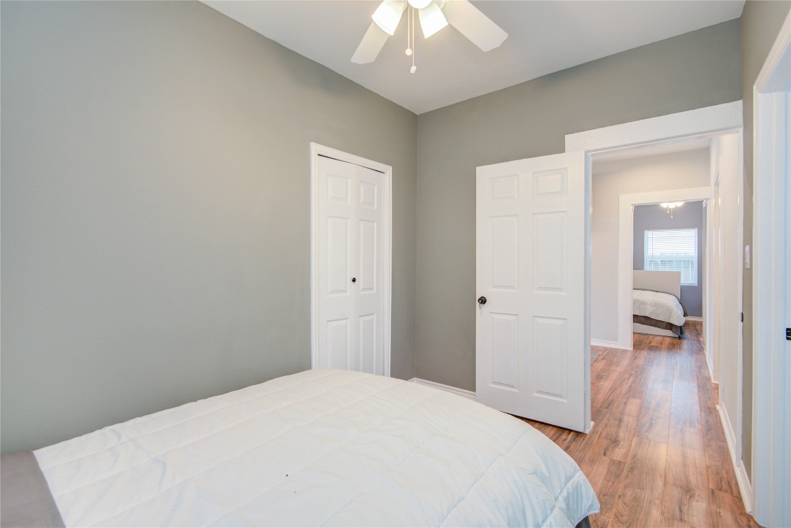 2712 Link Road Houston, TX 77009 - Photo 30 of 35 a bedroom with a bed and wooden floor