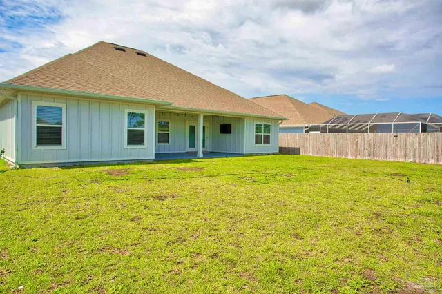 a front view of a house with swimming pool