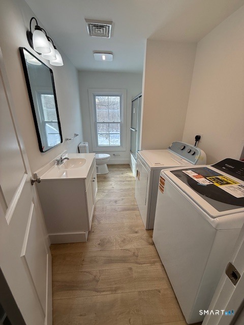 667 South Britain Road, Unit A Southbury, CT 06488 - Photo 3 of 8 a utility room with dryer and washer