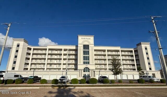 1805 Riverside Drive, Unit 404 Titusville, FL 32780 - Photo 1 of 19 front view of a building