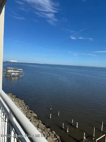 a view of balcony with furniture