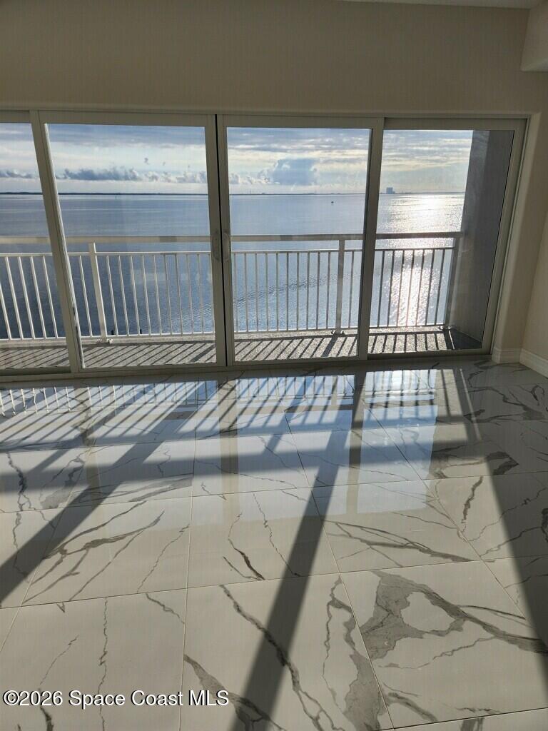 1805 Riverside Drive, Unit 404 Titusville, FL 32780 - Photo 9 of 19 a view of entryway with wooden floor
