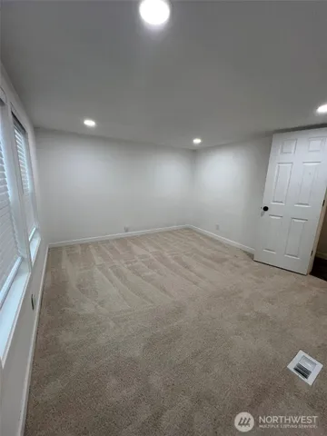 an empty room with a natural light