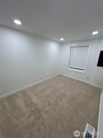 an empty room with a natural light