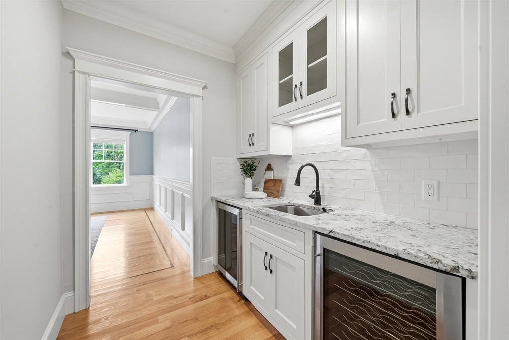 6 Flintlock Road Lexington, MA 02420 - Photo 13 of 39 a view of a kitchen with a sink and dishwasher