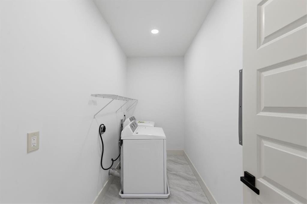 4107 Danforth Road Southwest Atlanta, GA 30331 - Photo 27 of 64 a utility room with dryer and washer